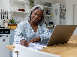 Woman looking at a laptop